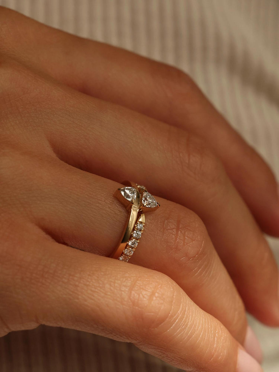 Trillion cut lab grown diamond two stone engagement ring, 0.20 carats total weight, set in a sleek prong design on polished gold band