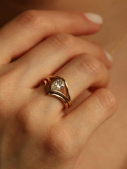 Pear cut lab grown diamond split shank engagement ring, 1.0 to 3.0 carats, set in elegant prong design on polished gold band