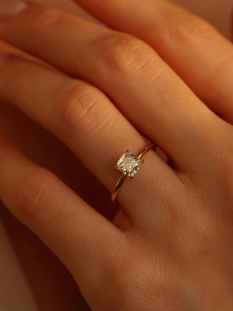 Cushion cut lab grown diamond solitaire engagement ring, 1.0 to 3.0 carats, set in a classic prong design on polished gold band