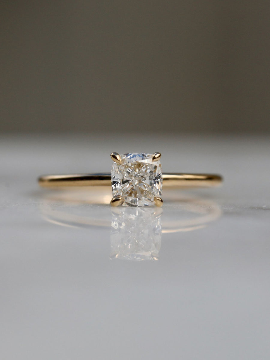 Cushion cut lab grown diamond solitaire engagement ring, 1.0 to 3.0 carats, set in a classic prong design on polished gold band