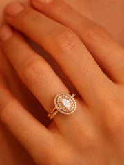 Oval cut lab grown diamond double halo and pavé engagement ring, 0.95 to 2.95 carats, set in elegant prong design on gold band