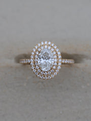 Oval cut lab grown diamond double halo and pavé engagement ring, 0.95 to 2.95 carats, set in elegant prong design on gold band