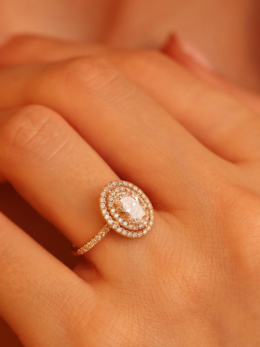 Oval cut lab grown diamond double halo and pavé engagement ring, 0.95 to 2.95 carats, set in elegant prong design on gold band