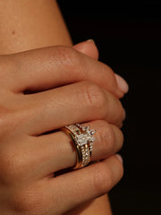 Emerald cut lab grown diamond pavé engagement ring, 0.90 to 2.50 carats, with side stones in a sleek prong setting on gold band