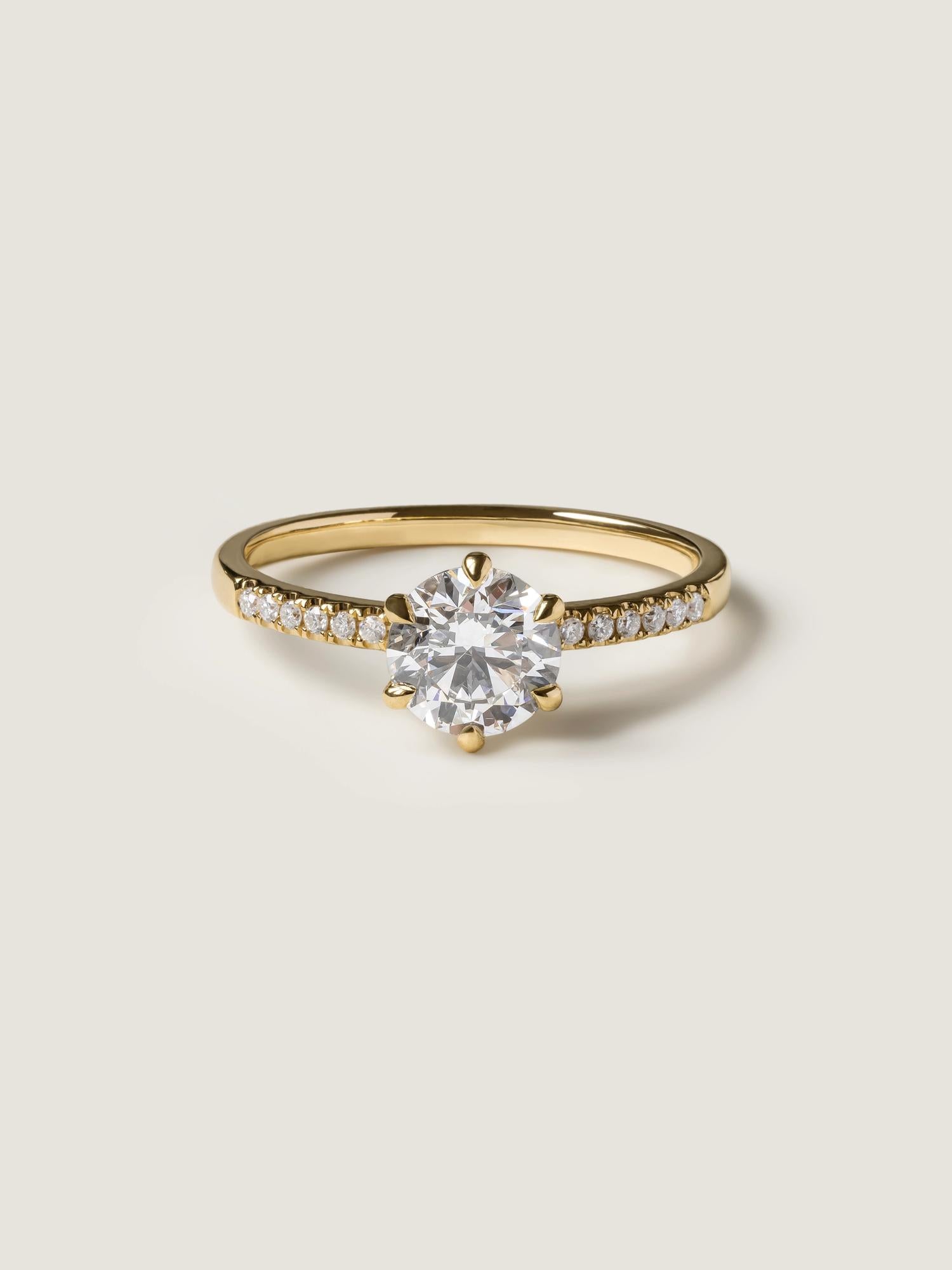 Round cut lab grown diamond pavé engagement ring, 1.01 to 3.01 carats, accented with side stones in a polished gold band