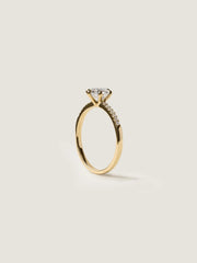 Round cut lab grown diamond pavé engagement ring, 1.01 to 3.01 carats, accented with side stones in a polished gold band