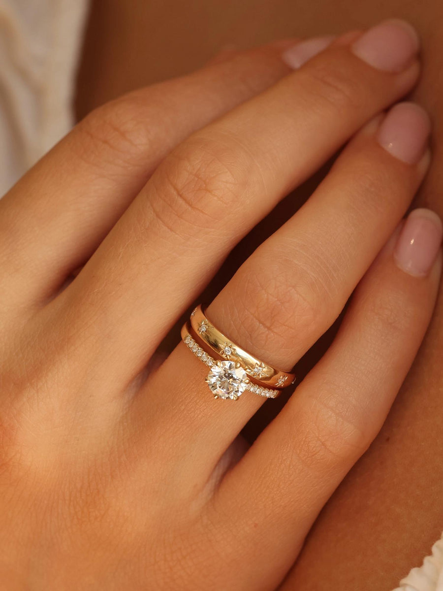 Round cut lab grown diamond pavé engagement ring, 1.01 to 3.01 carats, accented with side stones in a polished gold band