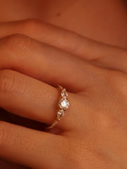 Round cut lab grown diamond three stone engagement ring, 0.50 to 2.50 carats, set in classic prong design on polished gold band