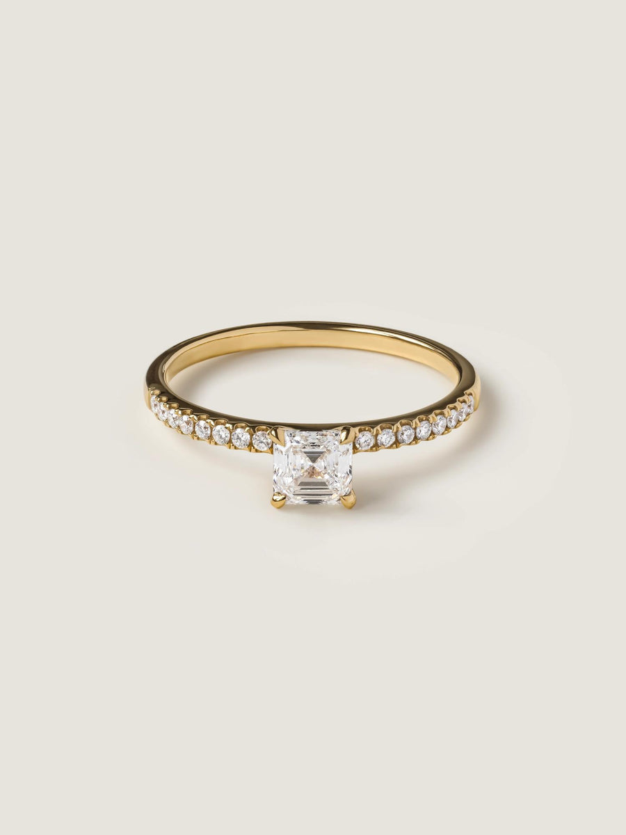 Asscher cut lab grown diamond pavé engagement ring, 0.50 to 2.50 carats, with side stones set in a polished gold band