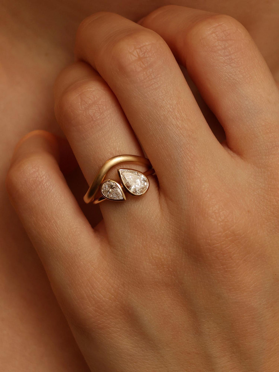 Two stone pear cut lab grown diamond engagement ring, 1.5 carats total, E/VS1 clarity, set in polished gold band