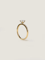 Asscher cut lab grown diamond pavé engagement ring, 0.50 to 2.50 carats, with side stones set in a polished gold band