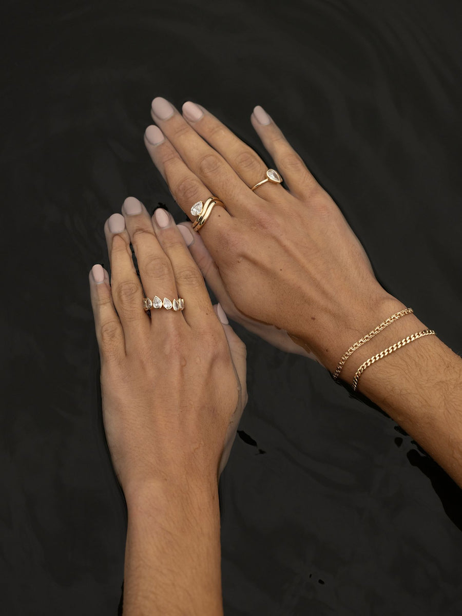 Two stone pear cut lab grown diamond engagement ring, 1.5 carats total, E/VS1 clarity, set in polished gold band