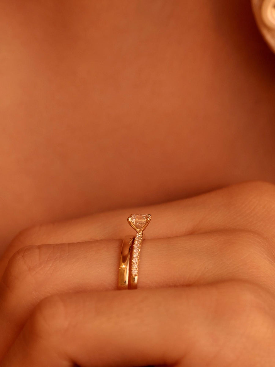 Asscher cut lab grown diamond pavé engagement ring, 0.50 to 2.50 carats, with side stones set in a polished gold band