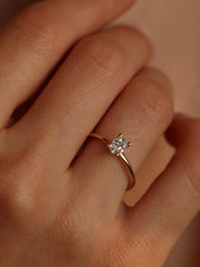 Oval cut lab grown diamond solitaire engagement ring, 0.50 to 2.50 carats, set in a classic prong design on polished gold band