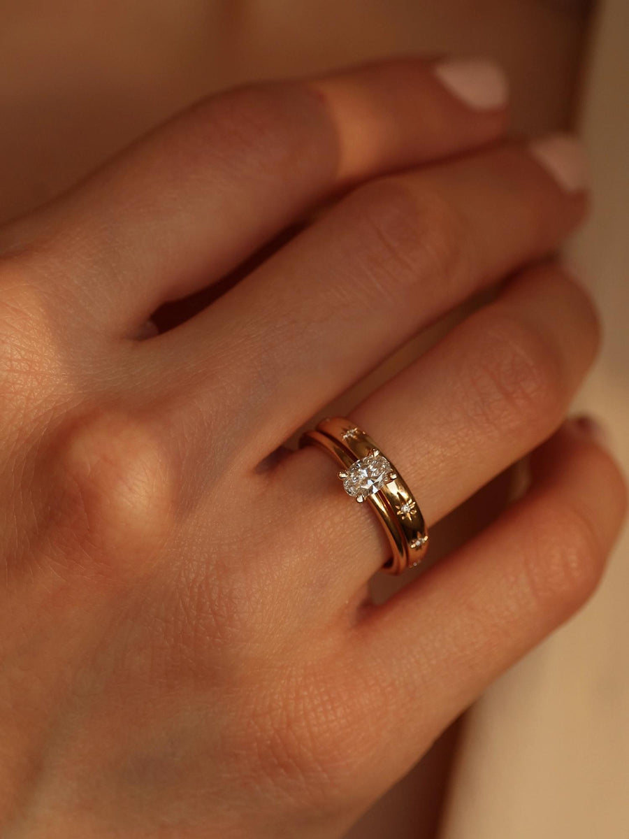 Oval cut lab grown diamond solitaire engagement ring, 0.50 to 2.50 carats, set in a classic prong design on polished gold band