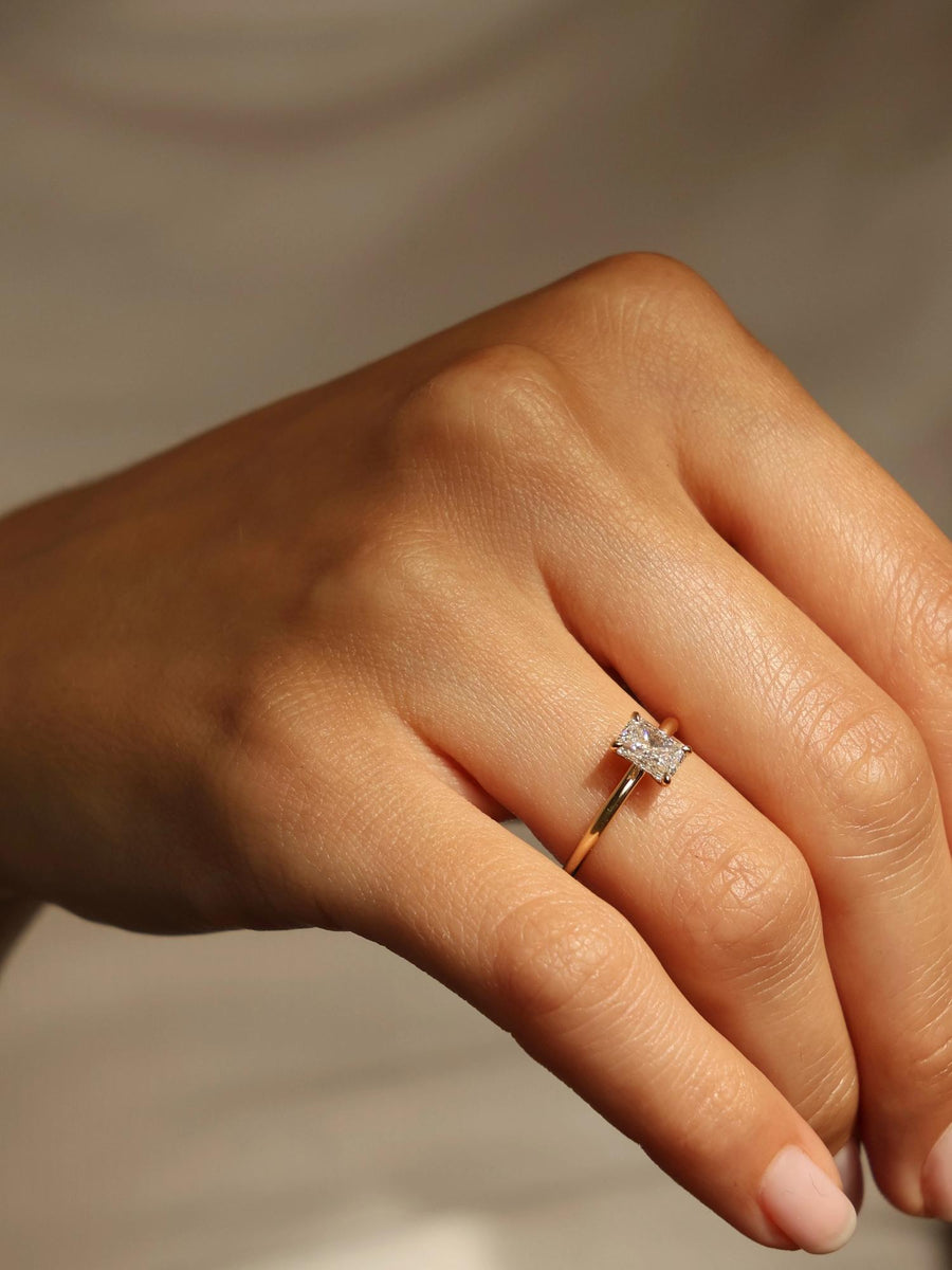 Radiant cut lab grown diamond solitaire engagement ring, 0.90 to 2.50 carats, set in classic prong design on polished gold band

