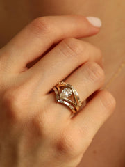 Pear cut lab grown diamond split shank engagement ring, 1.0 to 3.0 carats, set in elegant prong design on polished gold band