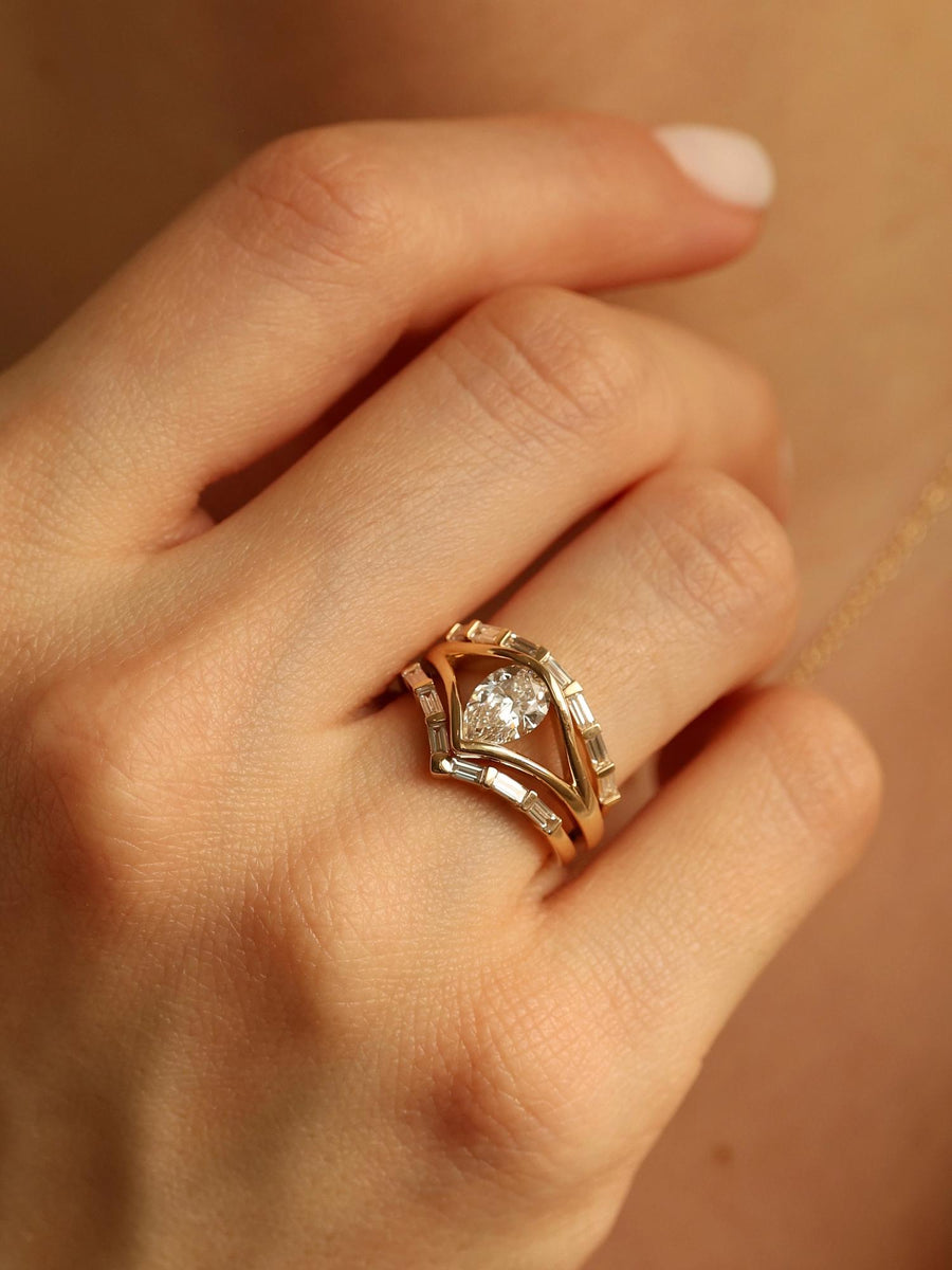 Pear cut lab grown diamond split shank engagement ring, 1.0 to 3.0 carats, set in elegant prong design on polished gold band