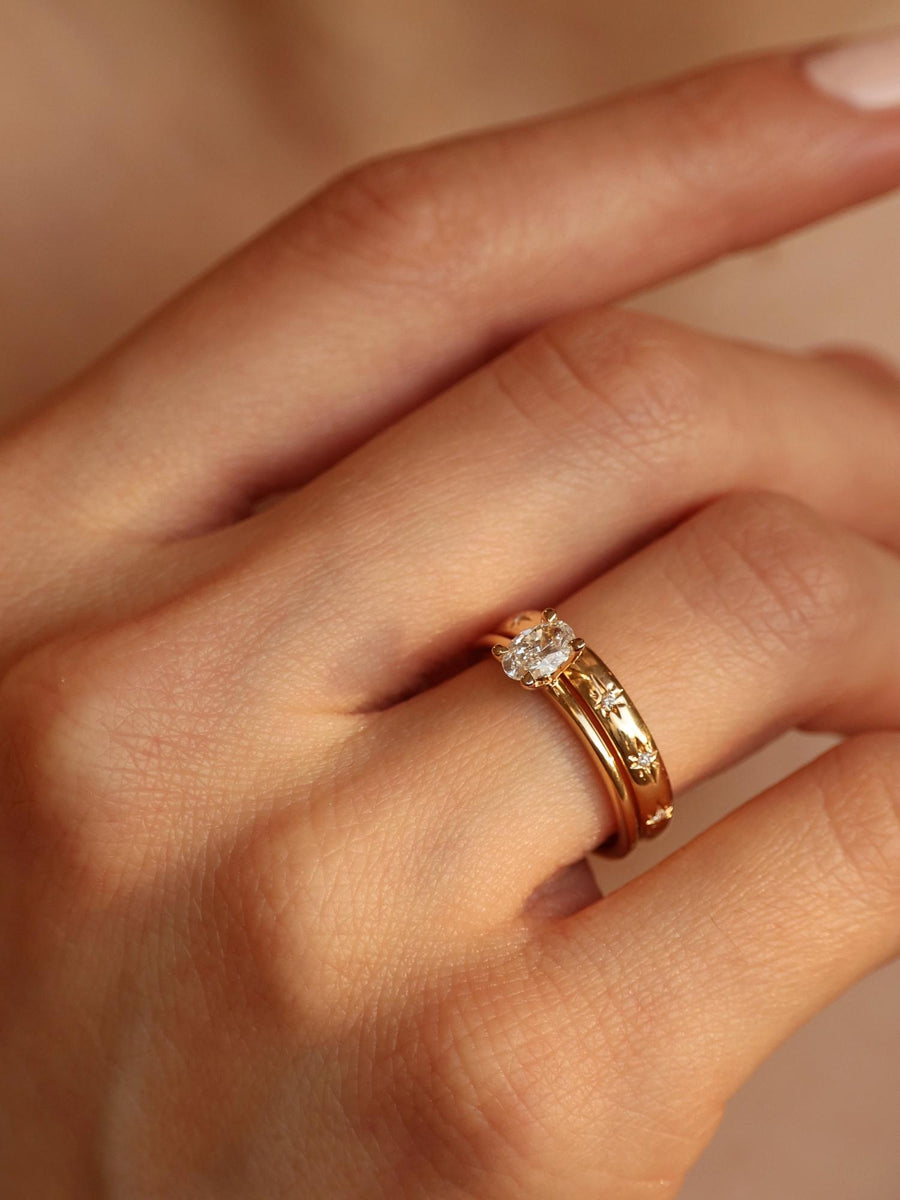 Oval cut lab grown diamond solitaire engagement ring, 0.50 to 2.50 carats, set in a classic prong design on polished gold band