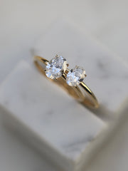 Oval cut lab grown diamond solitaire engagement ring, 0.50 to 2.50 carats, set in a classic prong design on polished gold band