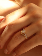 Oval cut lab grown diamond pavé engagement ring, 0.50 to 1.50 carats, with side stones in elegant prong setting on gold band