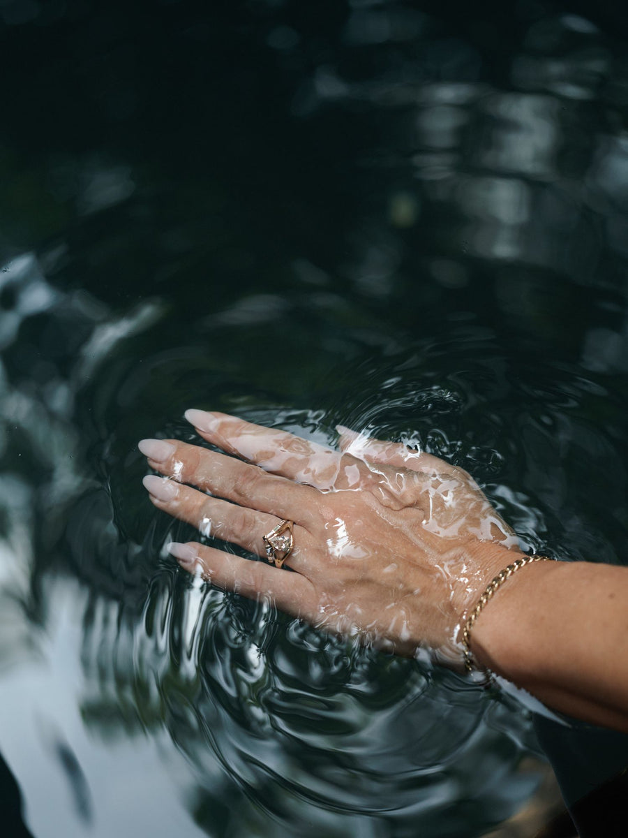 Pear cut lab grown diamond split shank engagement ring, 1.0 to 3.0 carats, set in elegant prong design on polished gold band