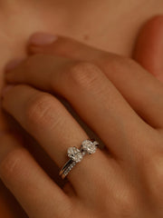 Oval cut lab grown diamond pavé engagement ring, 0.50 to 1.50 carats, with side stones in elegant prong setting on gold band