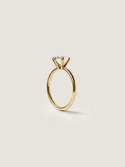 Round cut lab grown diamond solitaire engagement ring, 1.50 to 3.50 carats, set in timeless prong design on polished gold band