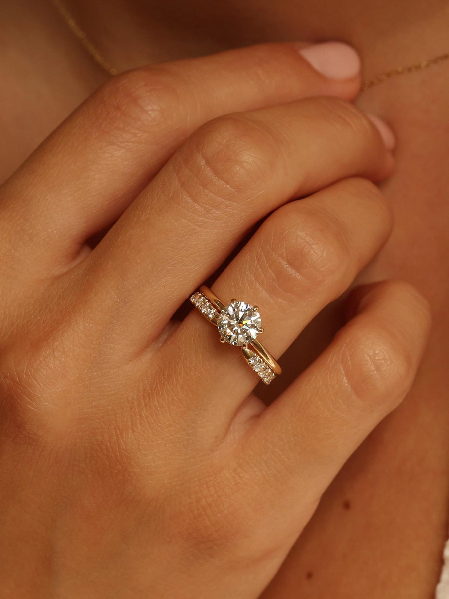 Round cut lab grown diamond solitaire engagement ring, 1.50 to 3.50 carats, set in timeless prong design on polished gold band