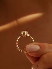 Oval cut lab grown diamond cluster engagement ring, 1.0 to 3.0 carats, featuring multiple accent stones set in a polished gold band