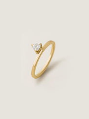 0.20 carat trillion cut lab grown diamond solitaire engagement ring in classic prong setting on polished gold band