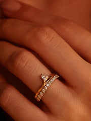 0.20 carat trillion cut lab grown diamond solitaire engagement ring in classic prong setting on polished gold band