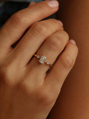 Radiant cut lab grown diamond three stone engagement ring, 1.05 to 3.05 carats, set in polished gold band with prong setting