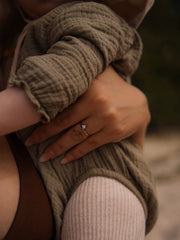 0.20 carat trillion cut lab grown diamond solitaire engagement ring in classic prong setting on polished gold band