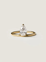 Pear cut lab grown diamond solitaire engagement ring, 1.0 to 3.0 carats, set in classic prong design on polished gold band