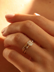 Radiant cut lab grown diamond three stone engagement ring, 1.05 to 3.05 carats, set in polished gold band with prong setting