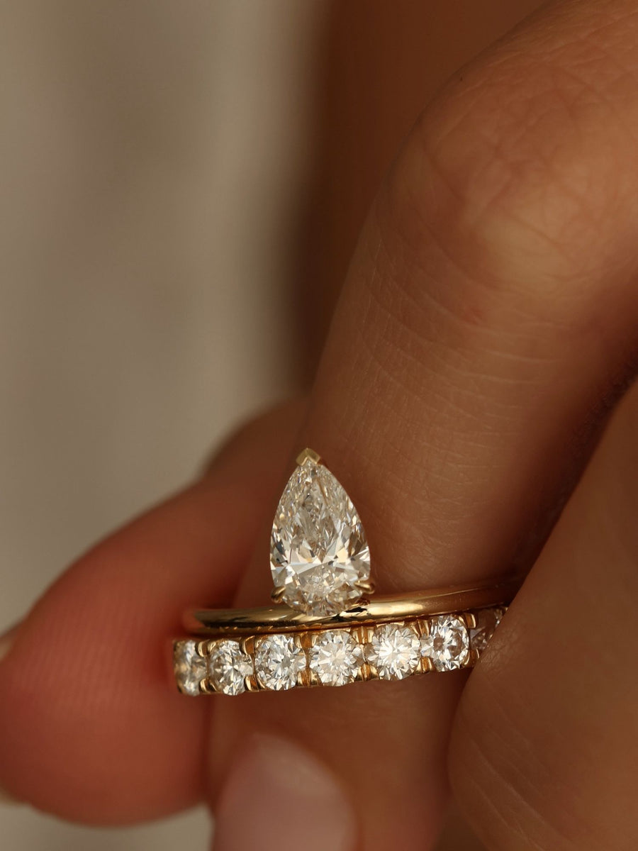 Pear cut lab grown diamond solitaire engagement ring, 1.0 to 3.0 carats, set in classic prong design on polished gold band