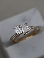 Emerald cut lab grown diamond pavé engagement ring, 0.50 to 2.50 carats, with side stones set in a polished gold band
