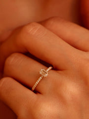 Emerald cut lab grown diamond pavé engagement ring, 0.50 to 2.50 carats, with side stones set in a polished gold band