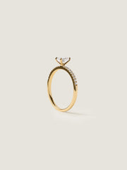 Emerald cut lab grown diamond pavé engagement ring, 0.50 to 2.50 carats, with side stones set in a polished gold band