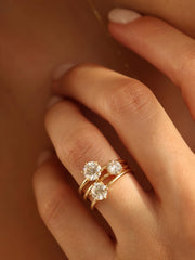 Round cut lab grown diamond solitaire engagement ring, 0.50 to 2.50 carats, set in a sleek prong design on polished gold band