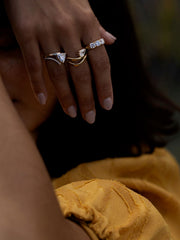 Round cut lab grown diamond three stone engagement ring, 1.50 to 3.50 carats, set in prong design on polished gold band