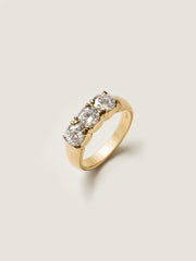 Round cut lab grown diamond three stone engagement ring, 1.50 to 3.50 carats, set in prong design on polished gold band