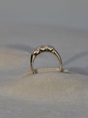 Round cut lab grown diamond three stone engagement ring, 1.50 to 3.50 carats, set in prong design on polished gold band