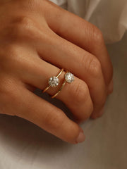 Round cut lab grown diamond solitaire engagement ring, 1.0 to 3.0 carats, set in traditional prong design on polished gold band
