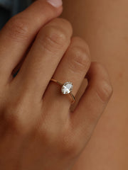 Oval cut lab grown diamond solitaire engagement ring, 1.0 to 3.0 carats, set in classic prong setting on polished gold band