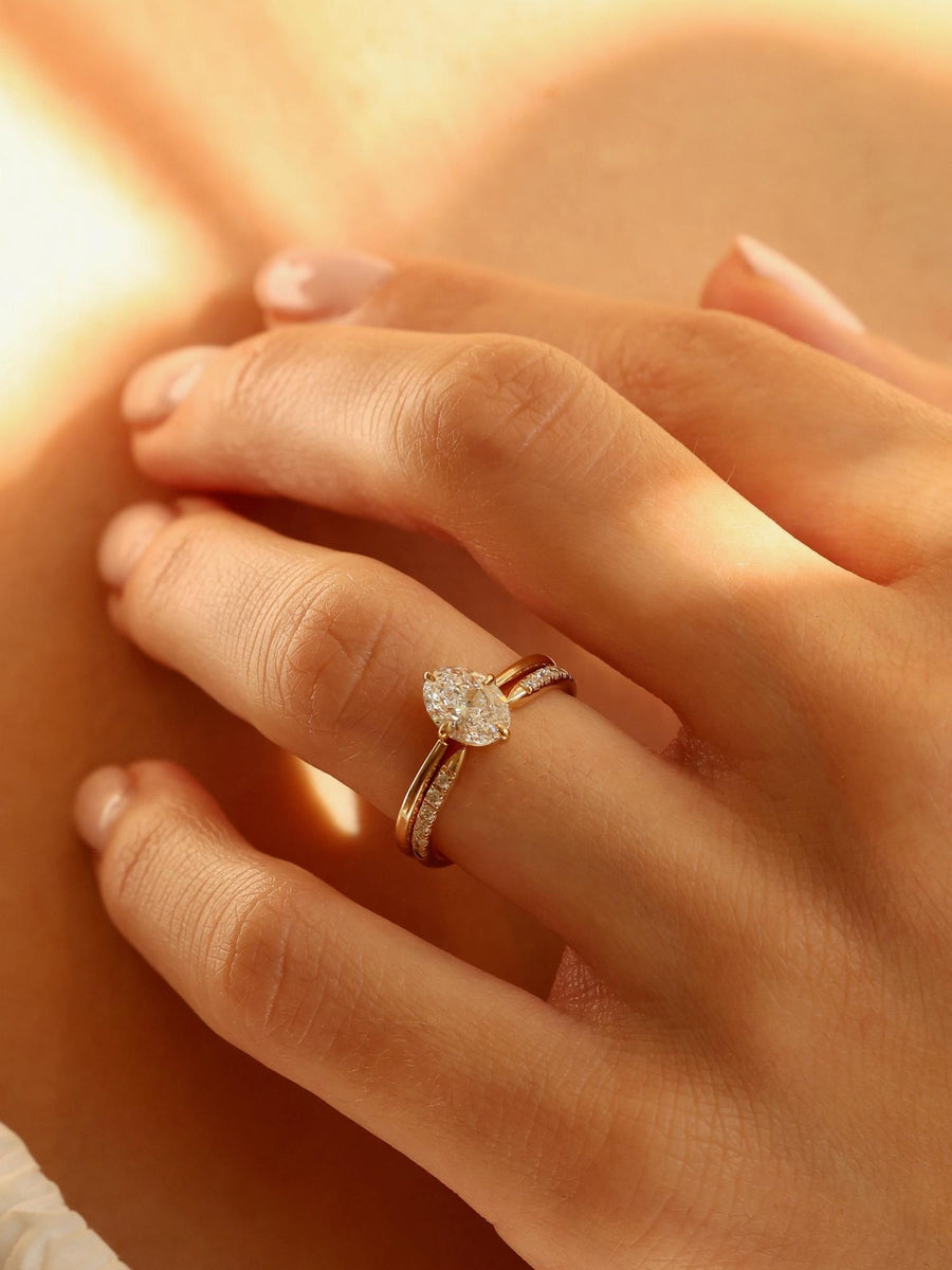 Oval cut lab grown diamond solitaire engagement ring, 1.0 to 3.0 carats, set in classic prong setting on polished gold band