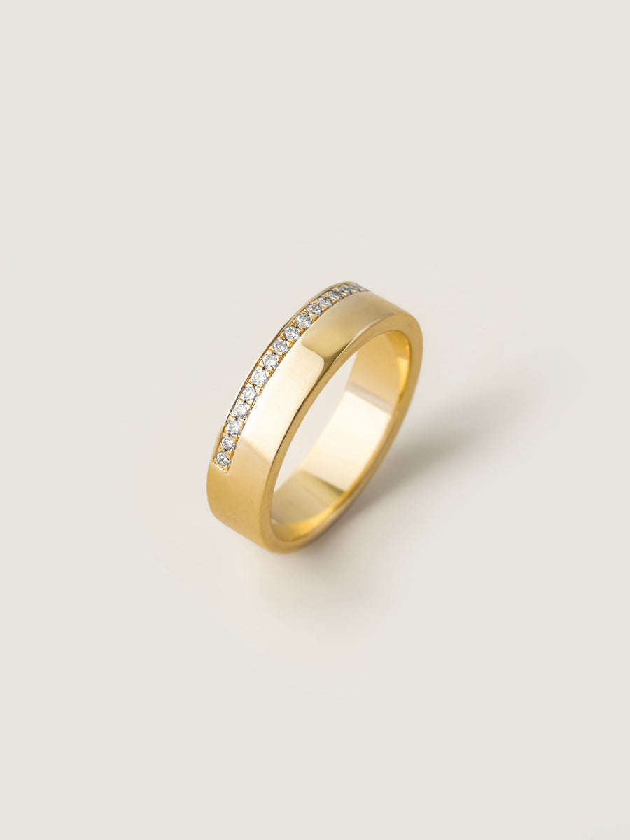 0.10 TCW Round Cut channel setting Wedding Band