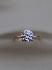 Round cut lab grown diamond solitaire engagement ring, 1.50 to 3.50 carats, set in classic prong design on polished gold band