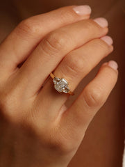 Radiant cut lab grown diamond three stone engagement ring, 1.0 to 3.0 carats, set in elegant prong setting on gold band